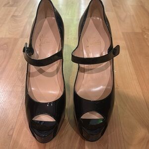 Excellent condition black louboutin platform heals